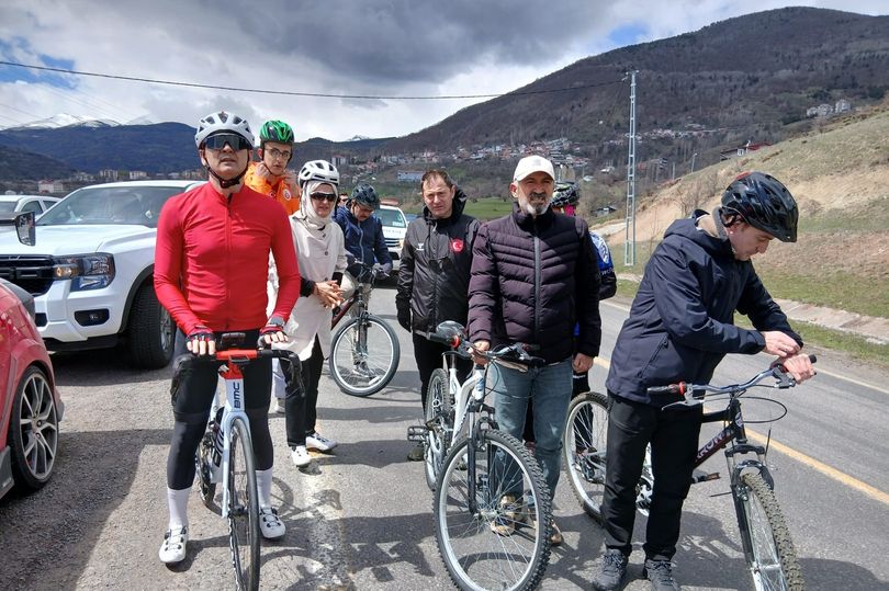 Ardahan Province Governor Mehmet Fatih Cicekli wearing tights on a bicycle accompanied by other cyclists