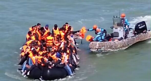 Watch as French throw life jackets to migrants during smugglers' 70-mile  Channel crossing - AOL