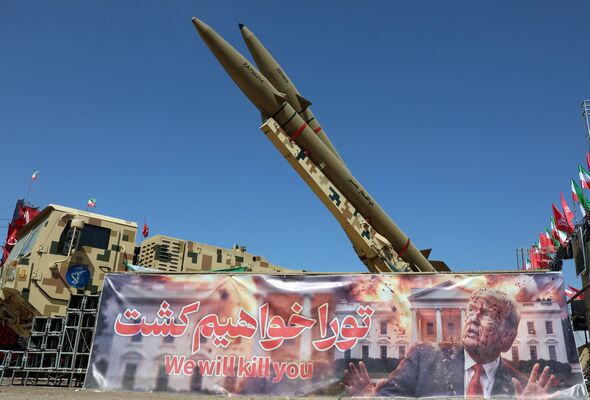 Iran chillingly warns Trump 'We will kill you' on banner depicting bloodied US President