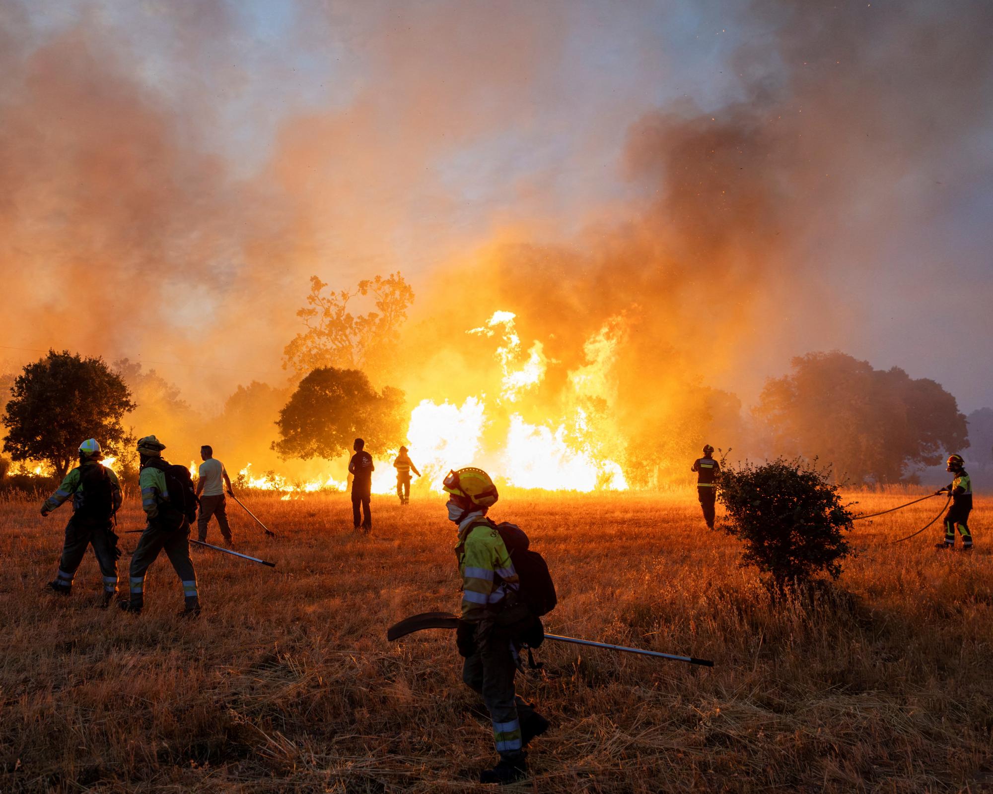 Firefighters race to extinguish blazes across EU as fire weather breaks records