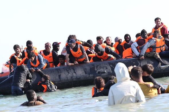 Watch as French throw life jackets to migrants during smugglers' 70-mile  Channel crossing - AOL