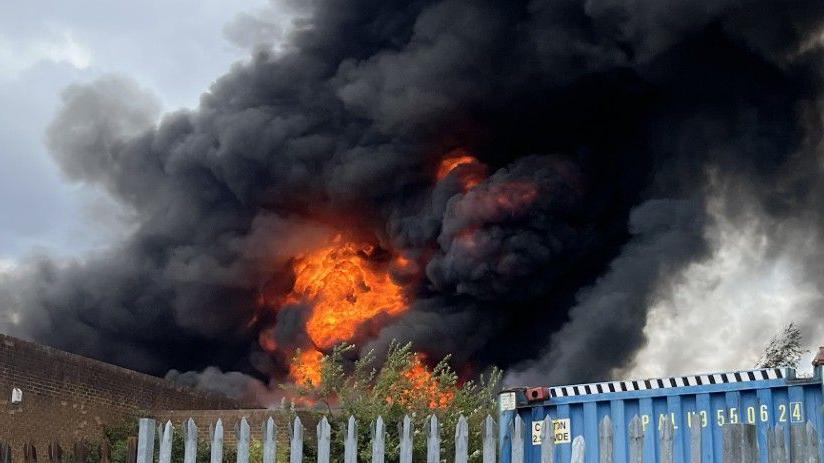 'Explosions' as fire blazes in industrial estate