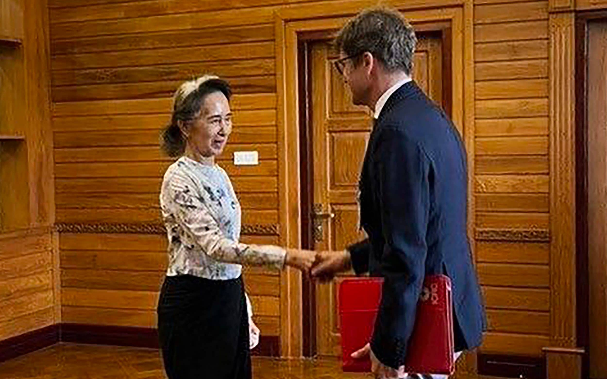 Aung San Suu Kyi pictured alive in rare photos released by Myanmar junta