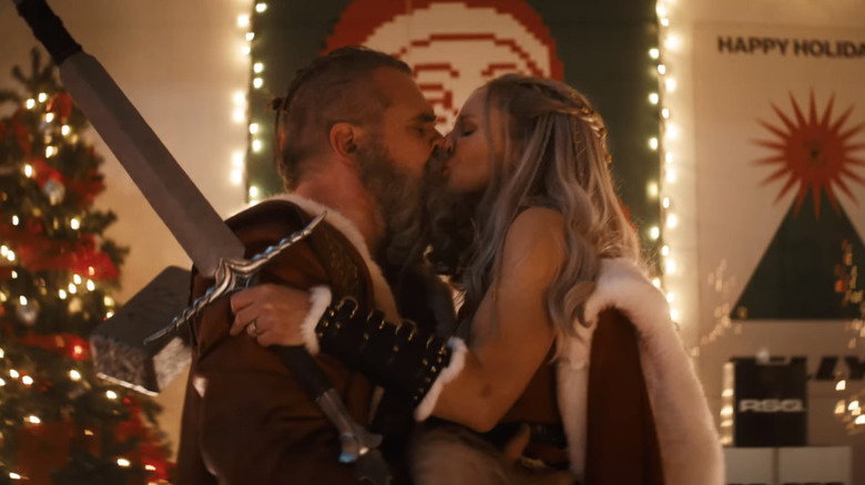 David Harbour's Santa Clause kisses Kristen Bell as Mrs. Claus in Violent Night 2