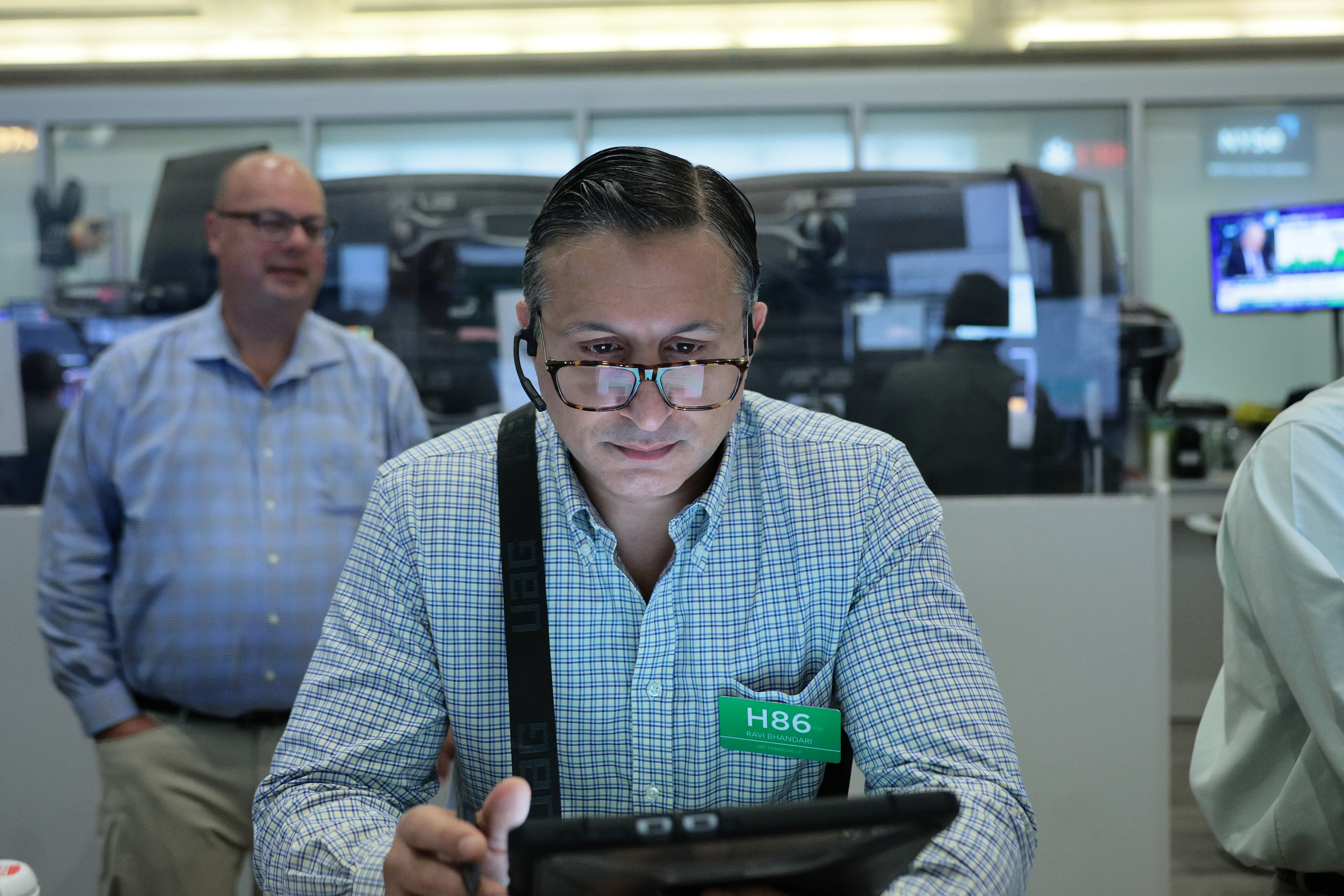 Stock market today: Nasdaq slips, Dow and S&P 500 futures inch up as earnings roll on
