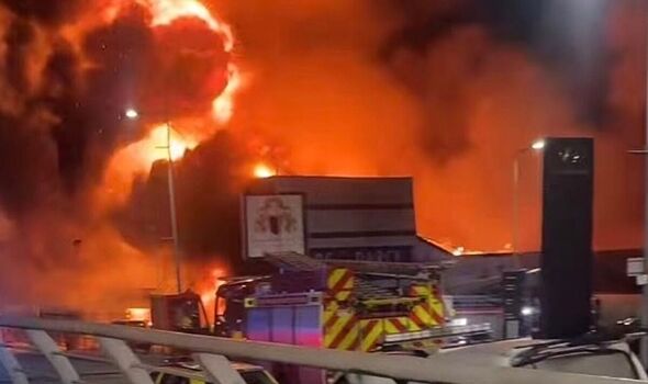 Salford fire LIVE: Huge blaze rips through building on busy road - 'Keep windows shut'
