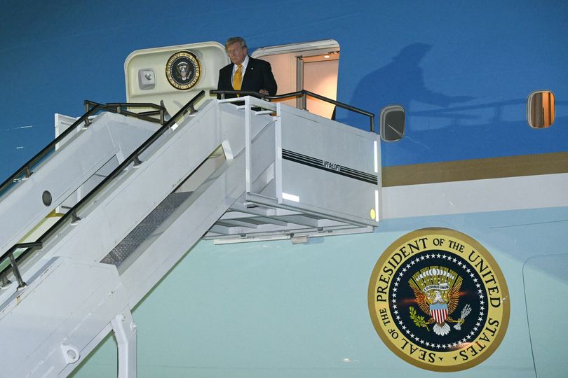 Mystery moment Trump sneaks back onto Air Force One after secretly fleeing jet without press due to Iran threat