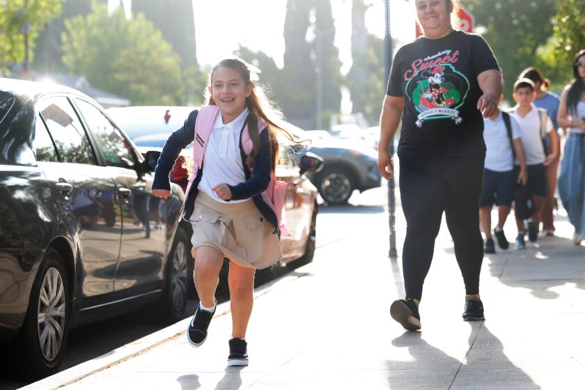 LAUSD's first day of school: New algebra books, looming layoffs and putrid odors