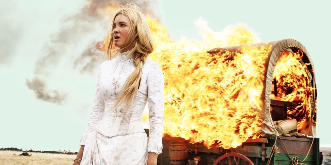 Isabel May as Elsa Dutton standing in front of burning wagon in '1883'