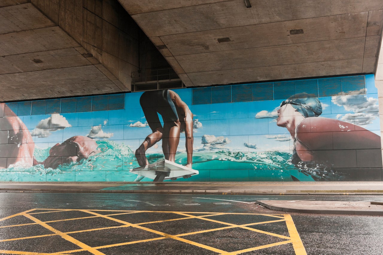 Procure murais de rua em Glasgow, incluindo este em Springfield Quay, que foi pintado para celebrar os Jogos da Commonwealth em 2014 (Getty Images)