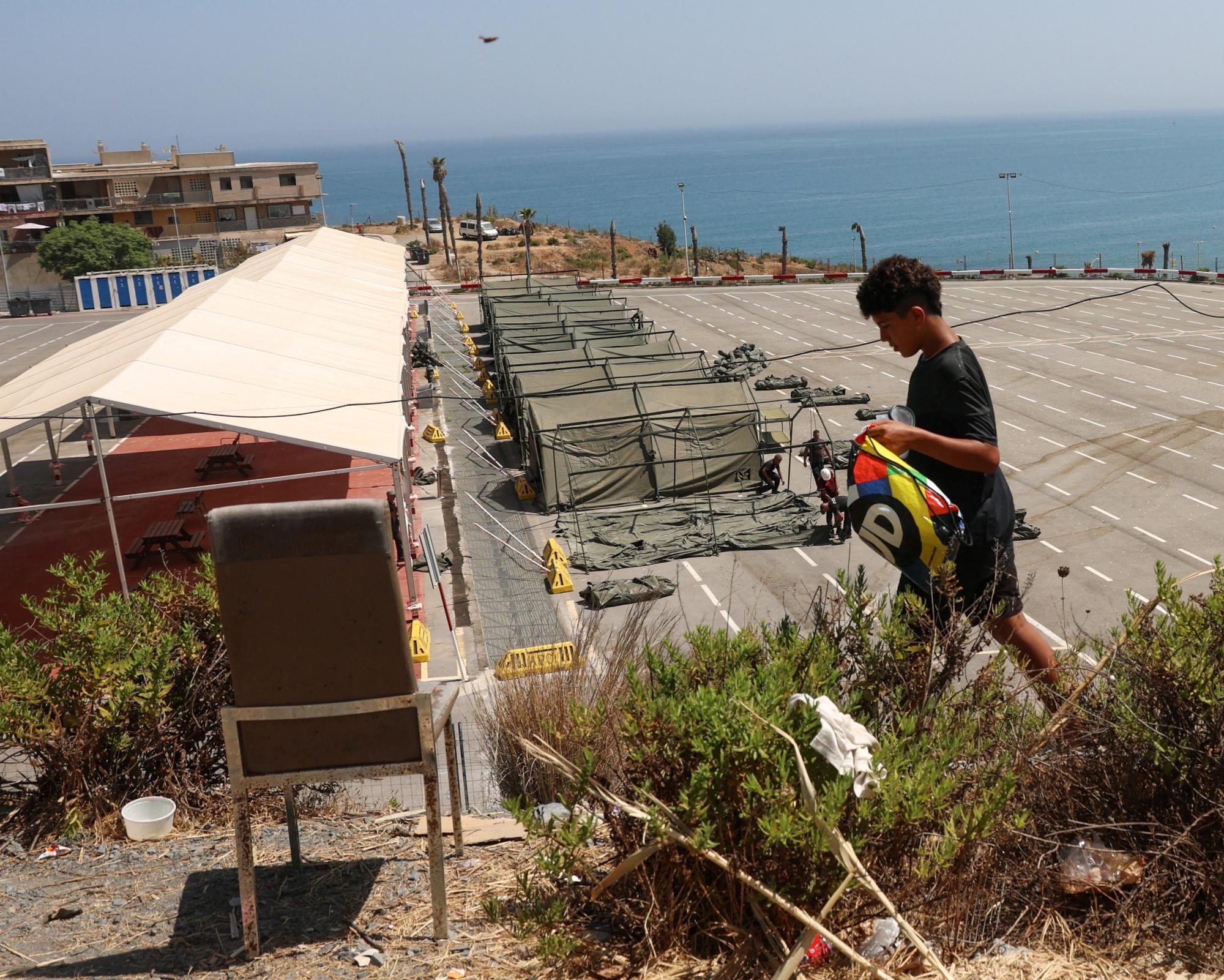 Spain to allow 500 children in Ceuta to go to mainland in immigration U-turn