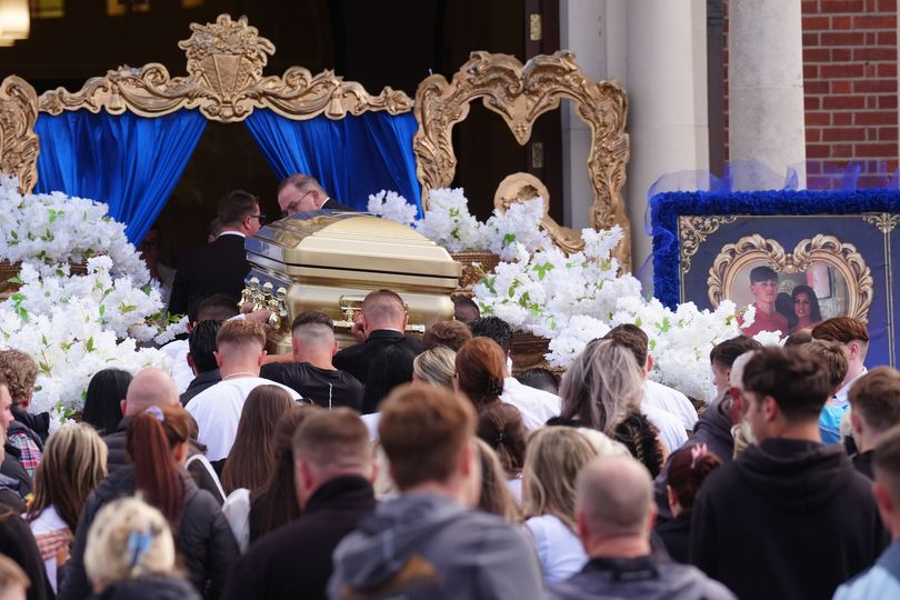 Gold coffin carried through streets as mourners gather for teen killed in M9 crash
