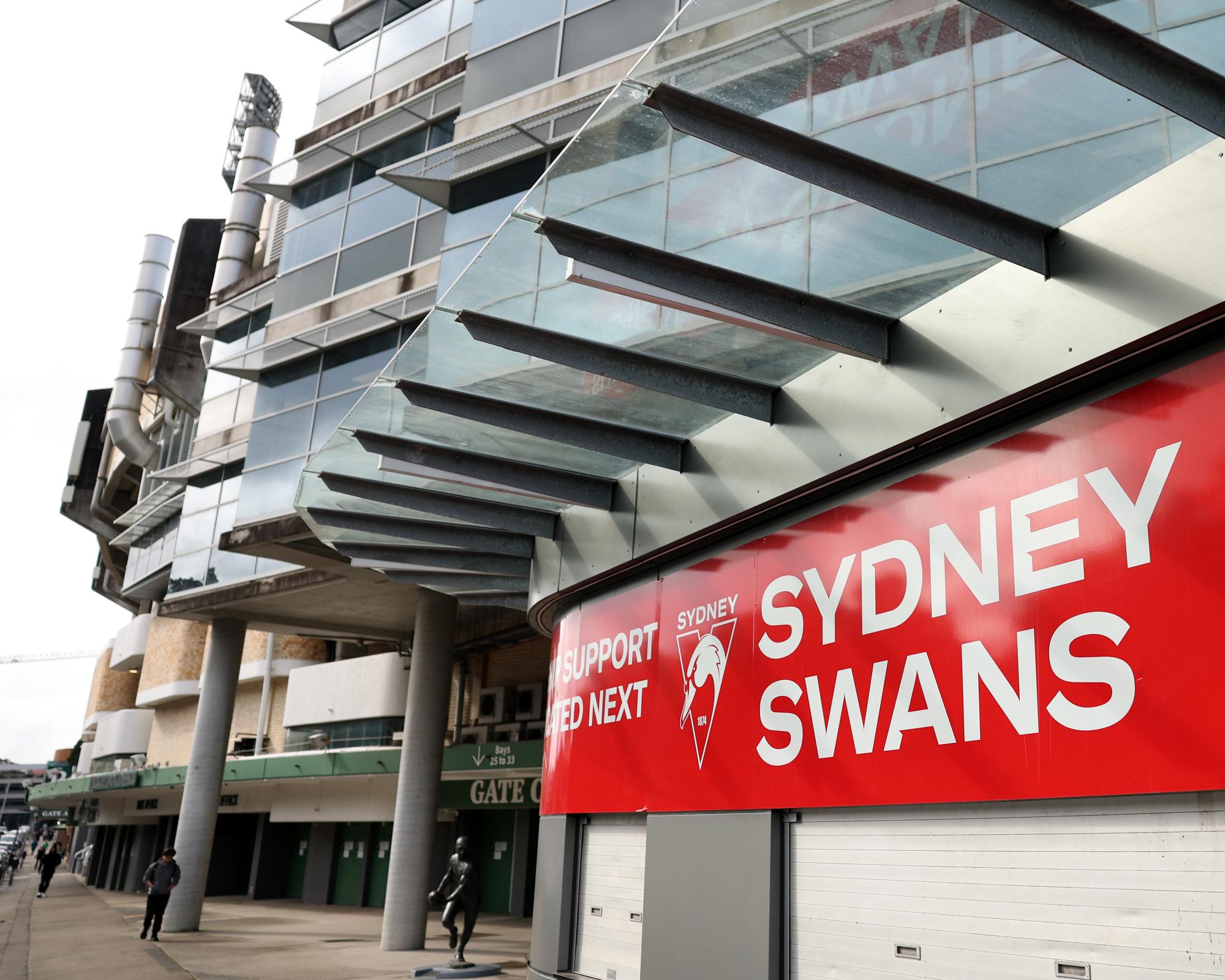 Third woman who joined Sydney Swans players in Melbourne hotel considers legal action after ‘entire world turned upside down'