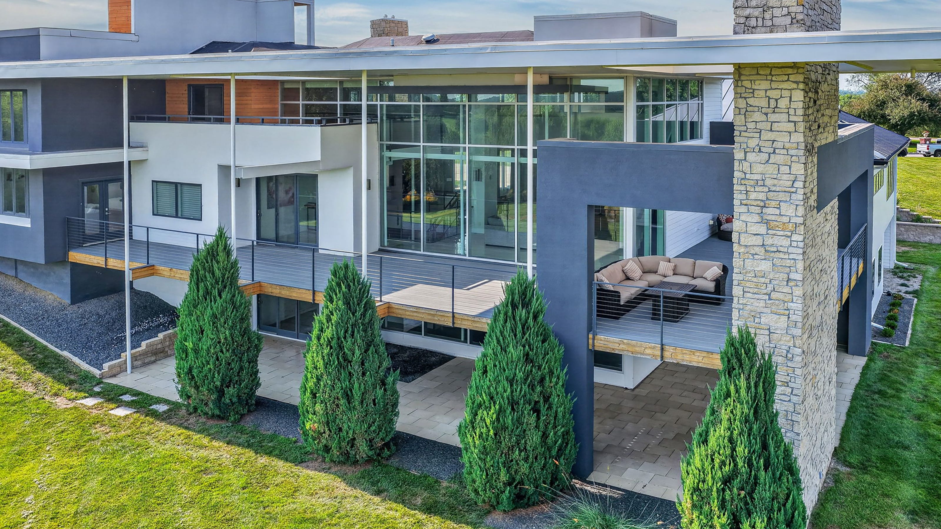 This $2.1 million Waukee property features a rooftop deck, sauna