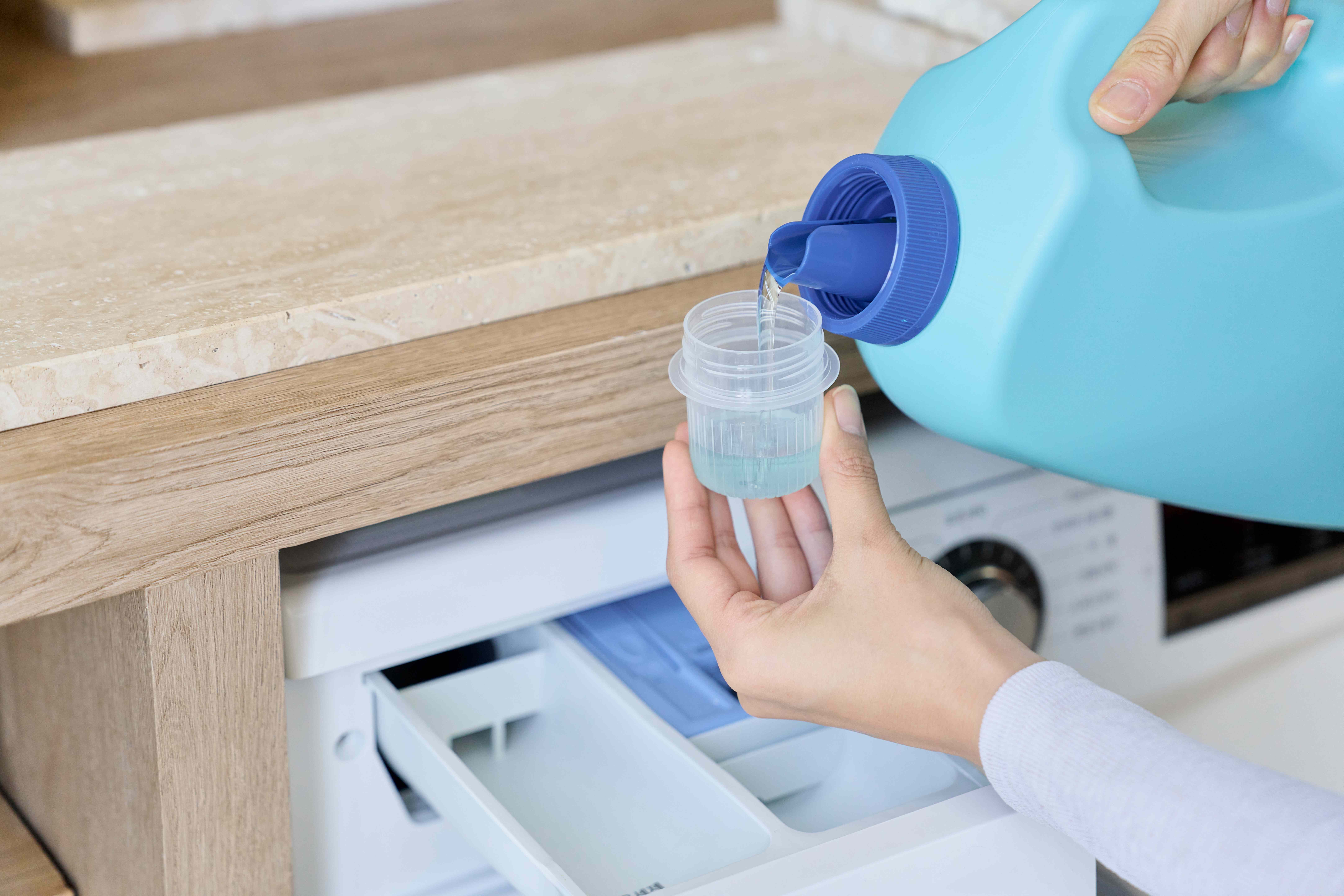 You’re Probably Using Your Detergent Cup Wrong—Here’s What To Do Instead