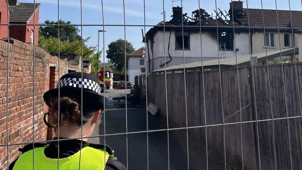Murder probe as two people dead in house fire
