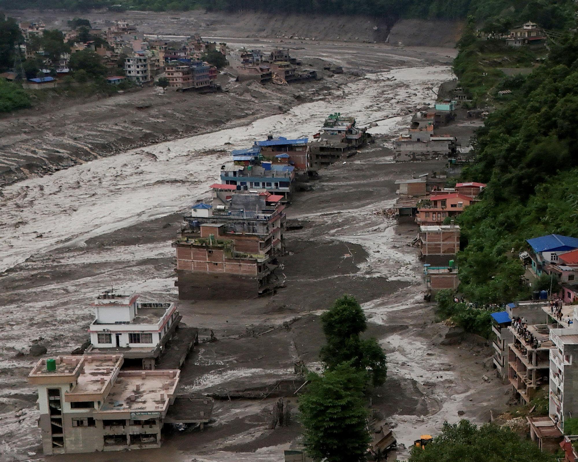 Girl, 13, among missing British citizens after flash flood in Nepal