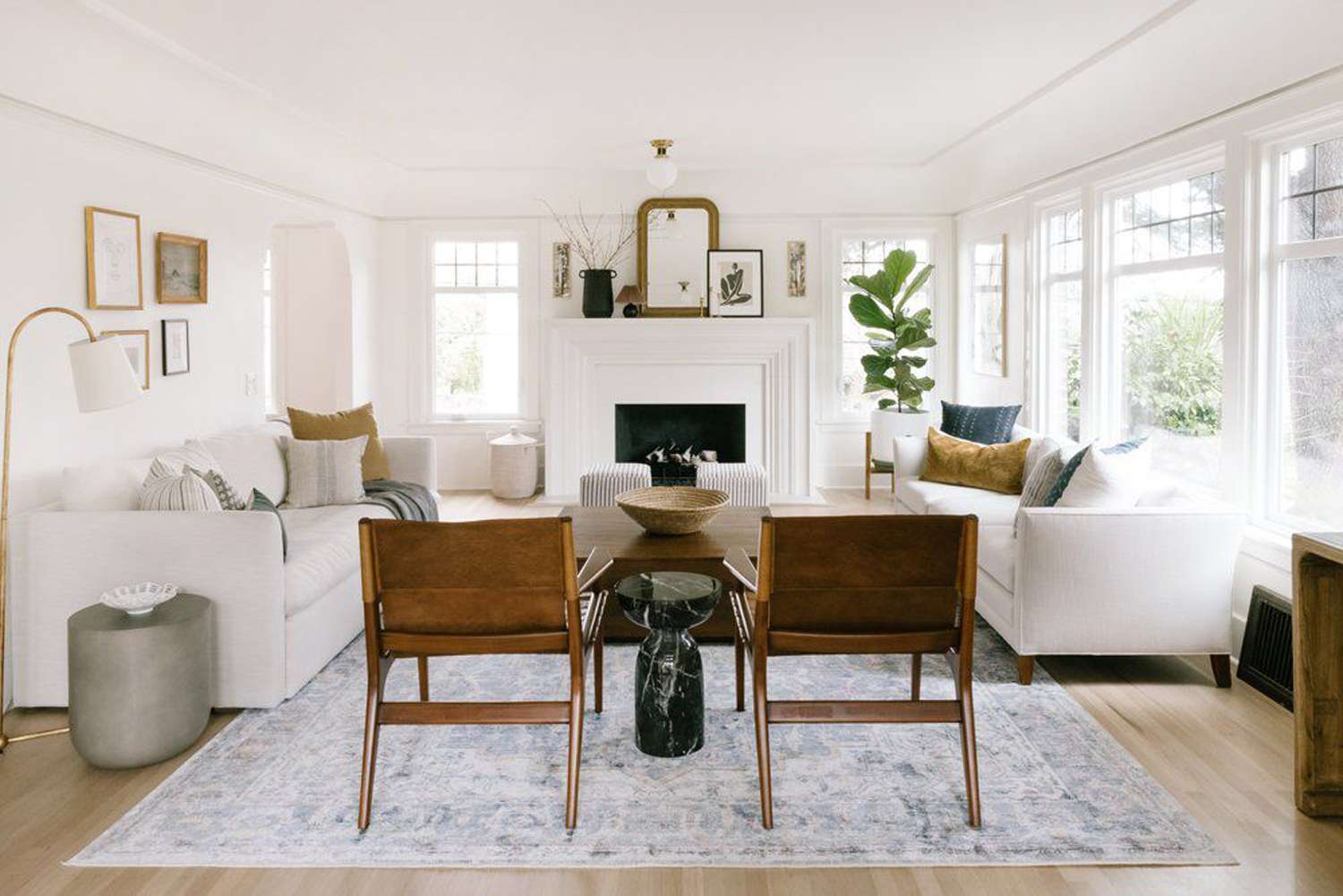 We Asked Designers How to Arrange a Living Room So It Feels Airy, Not Empty—Their 6 Top Tips