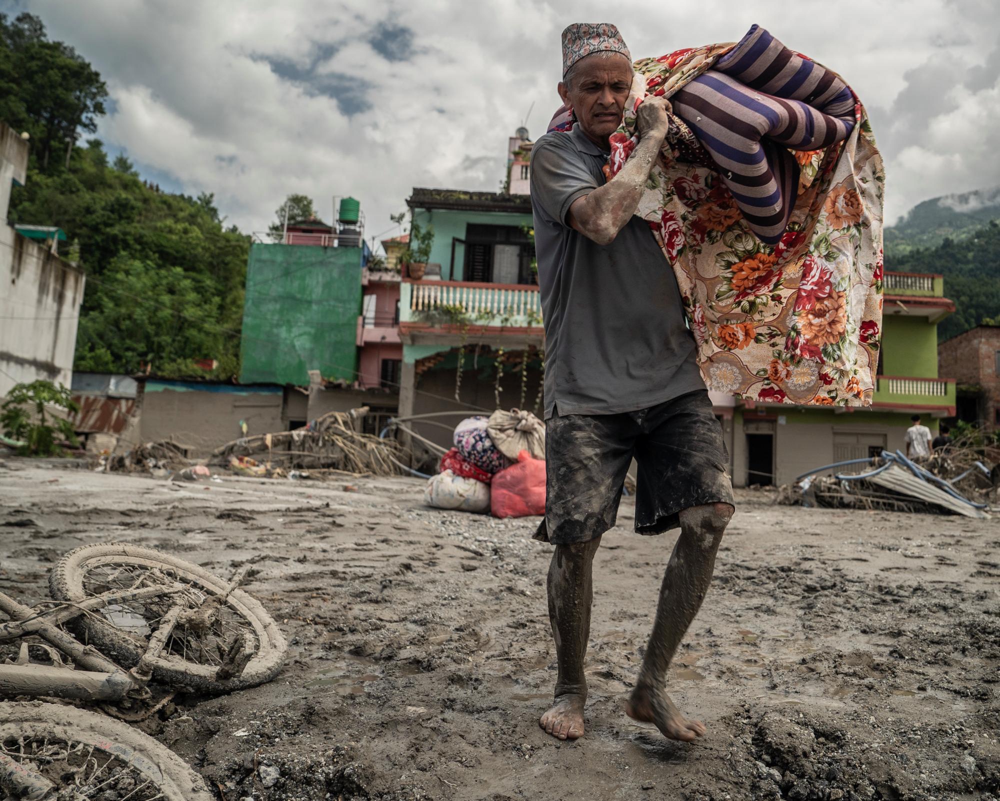 ‘The river has taken everything': people return to remains of their homes in Nepal