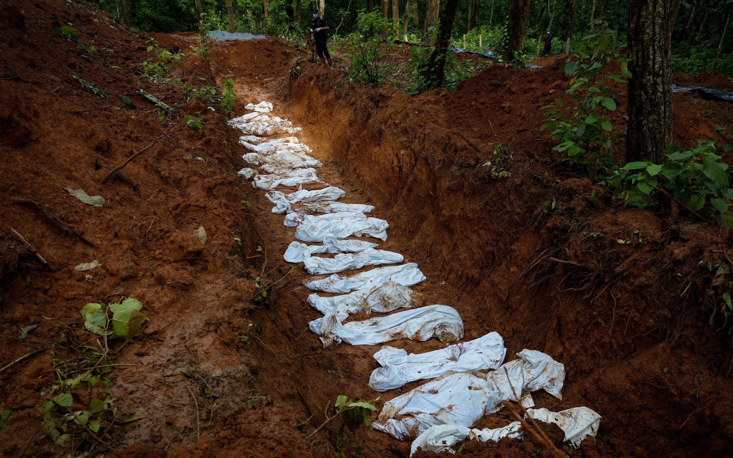 Overwhelmed by bodies, hope is fading in Nepal