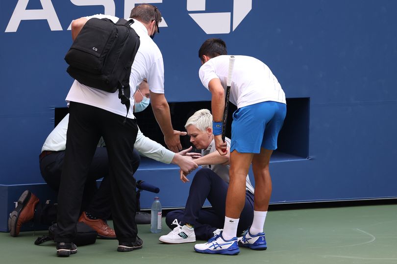New Photo - US Open star escapes punishment for smashing ball at fan despite Novak Djokovic DQ