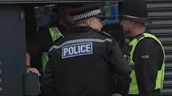 Illegal goods and dog seized in high street raids