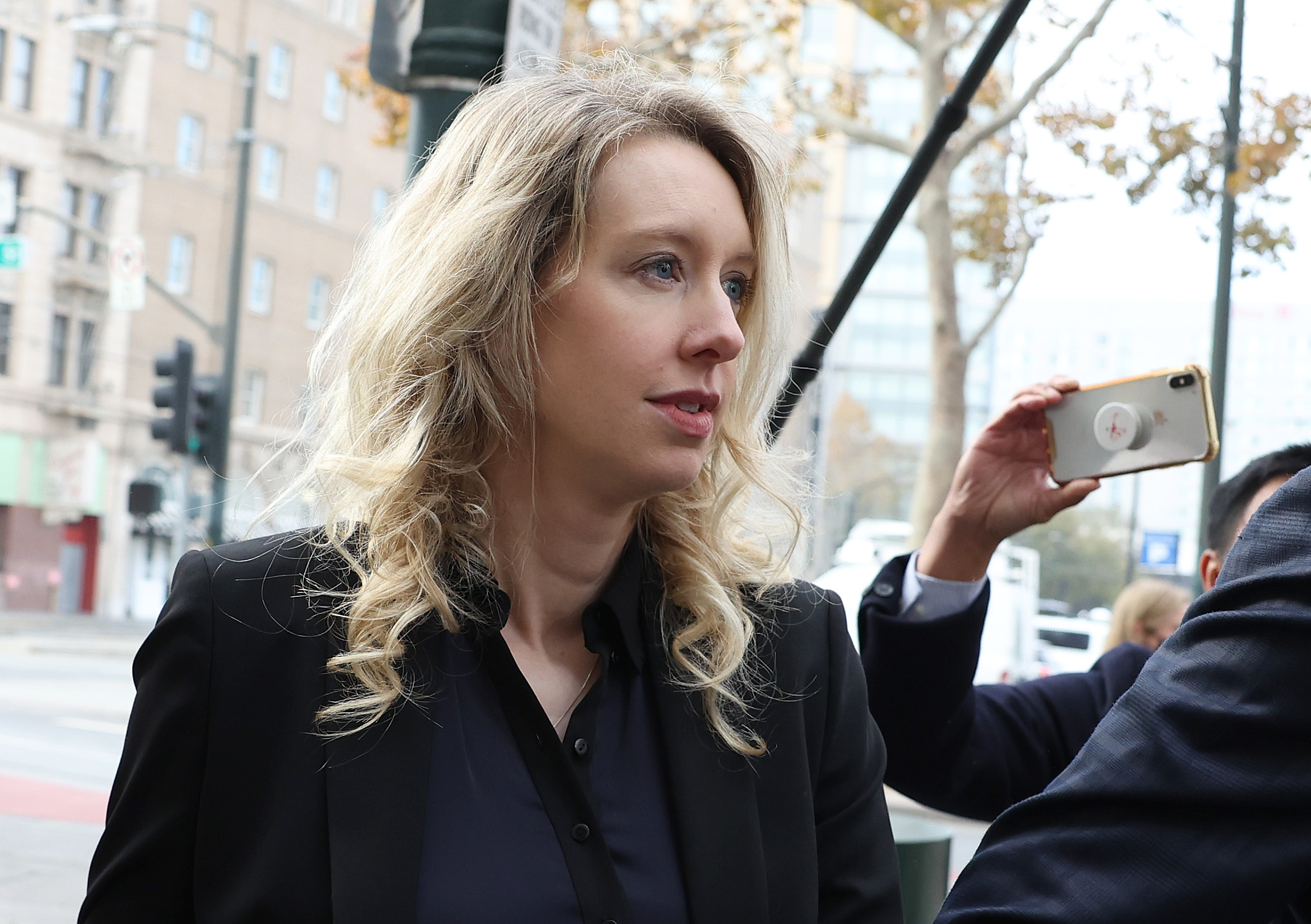 Surprise new Elizabeth Holmes documentary follows Theranos founder's final weeks before prison