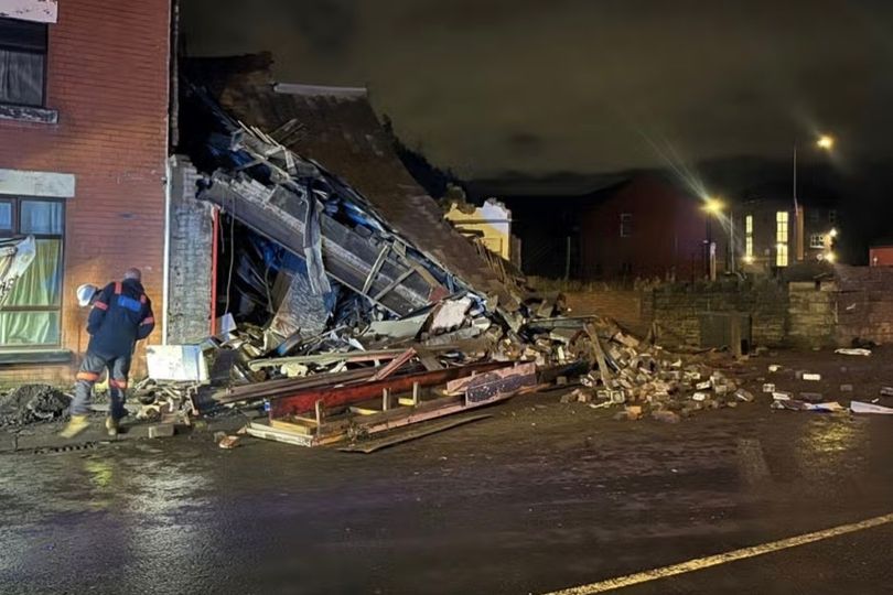 Vehicle crashes into shop in Bolton as building collapses and road closed