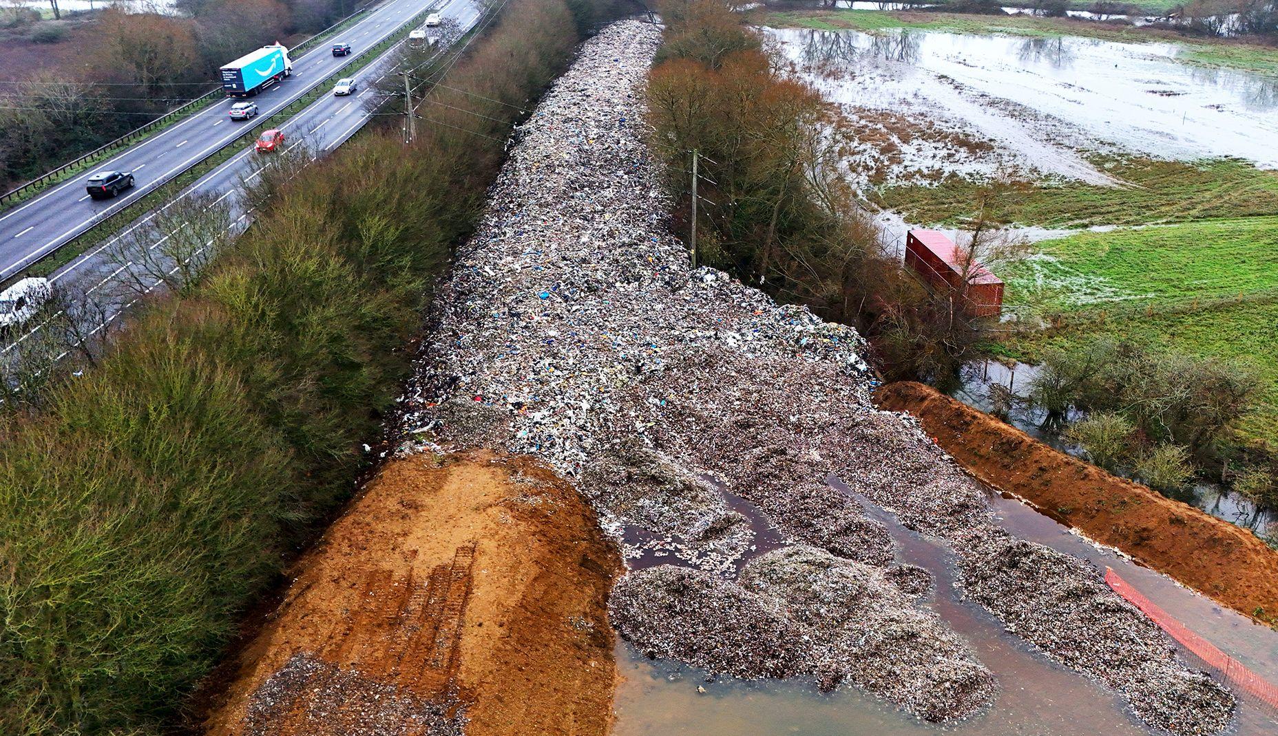 Two more men arrested over huge illegal waste dump