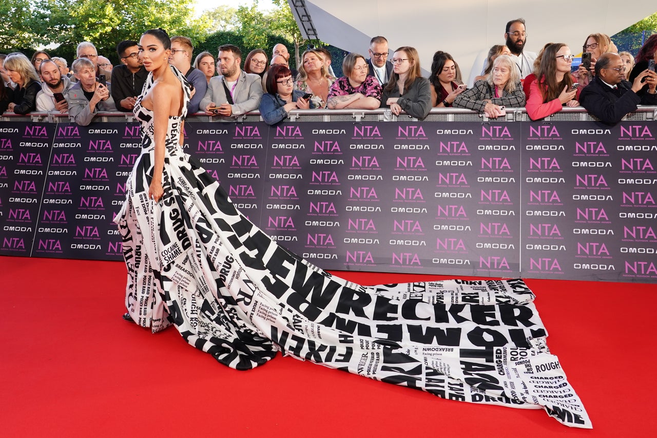 New Photo - Tulisa shows off gown covered in headlines from drug sting scandal on NTA red carpet