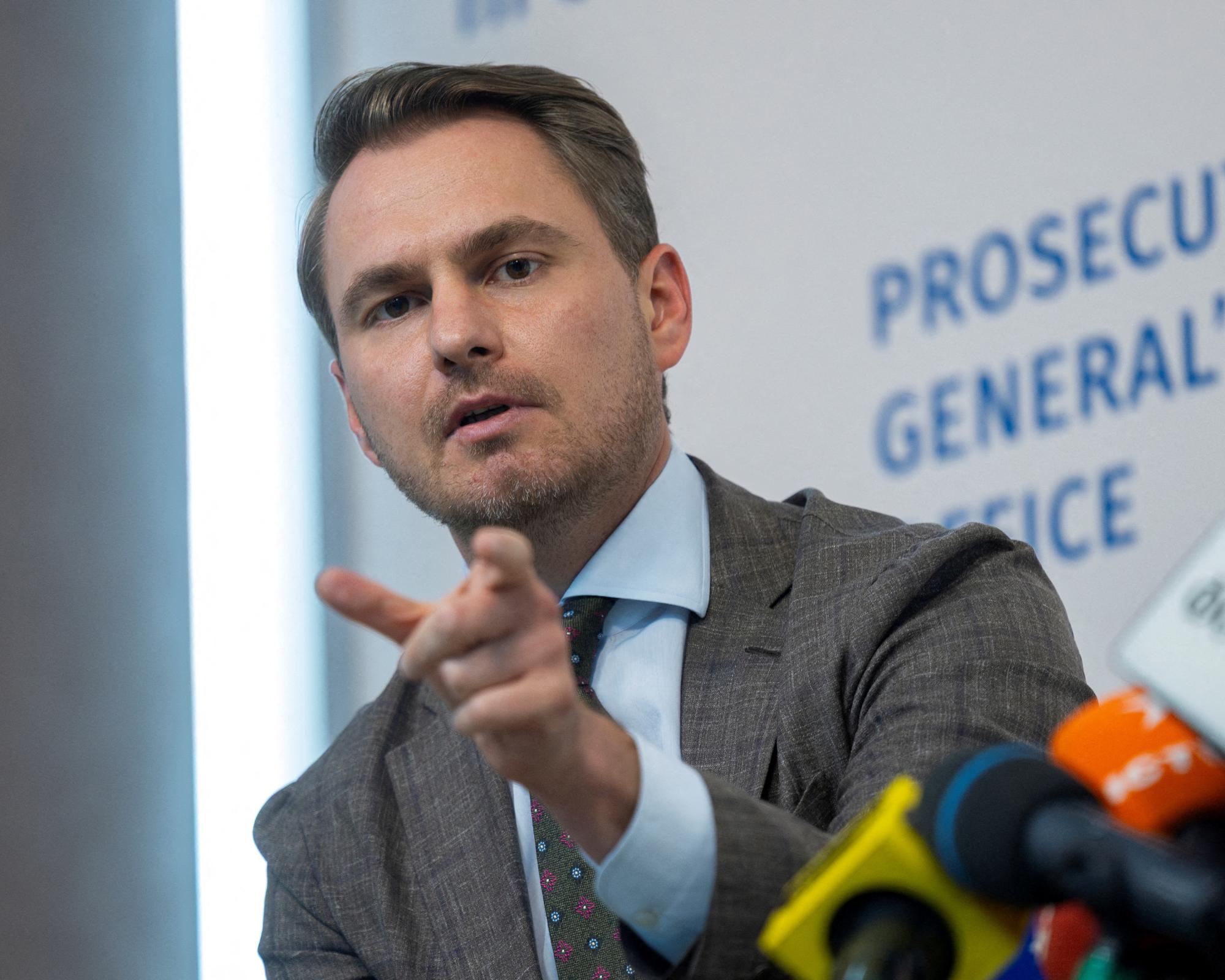 Ukraine's prosecutor general quits after anti-corruption agents raid his office
