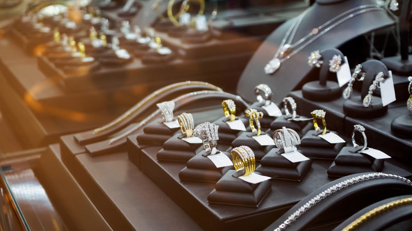 Jewelry display case with diamond rings and necklaces