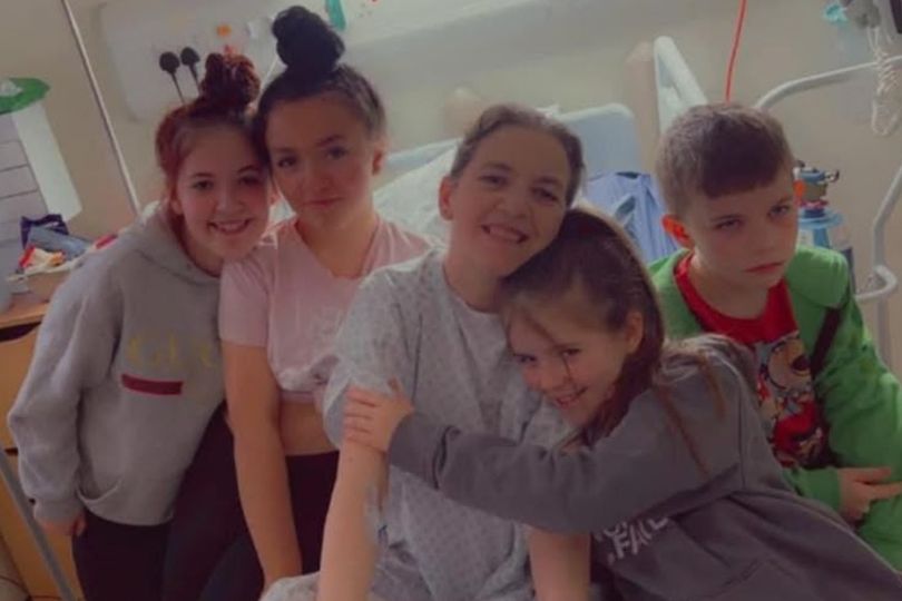 Cancer-stricken mum learns all three daughters need chemo after brutal triple diagnosis