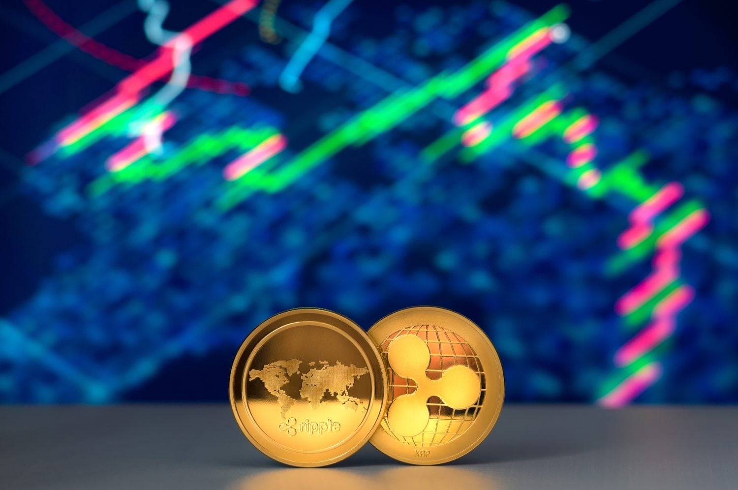 Ripple Cryptocurrency XRP with financial charts on background