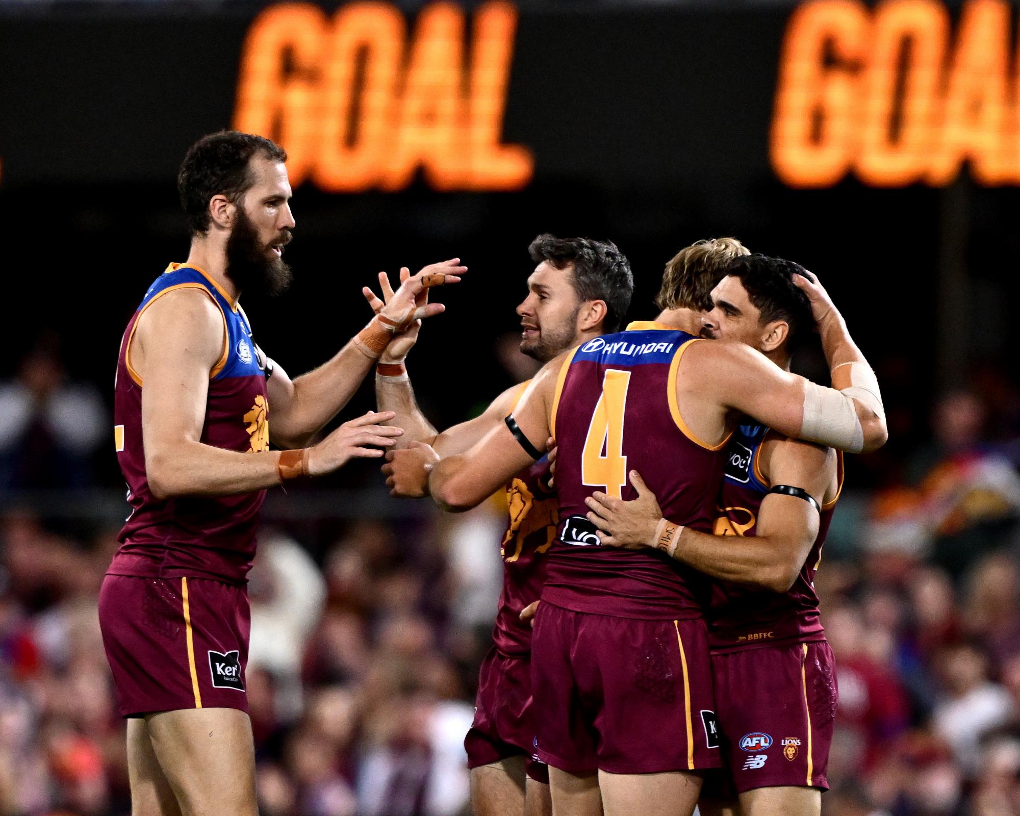 Lions rewarded for embracing risk as ‘good Brisbane' keep AFL flag dream alive