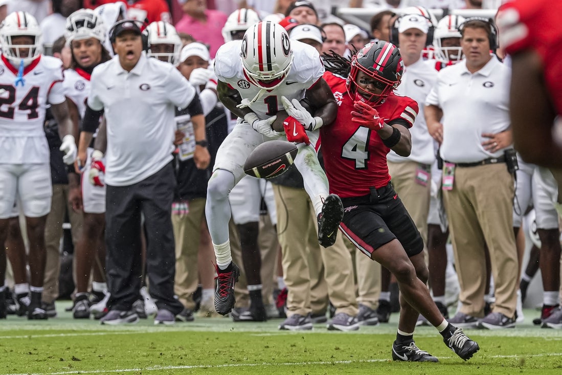 Gunner Stockton throws 5 TDs as No. 2 Georgia crushes Western Kentucky - AOL
