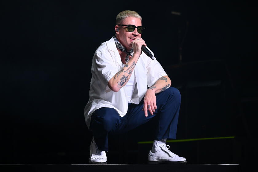 Macklemore removed from Ed Sheeran's tour after onstage support for Palestinians. He has no regrets