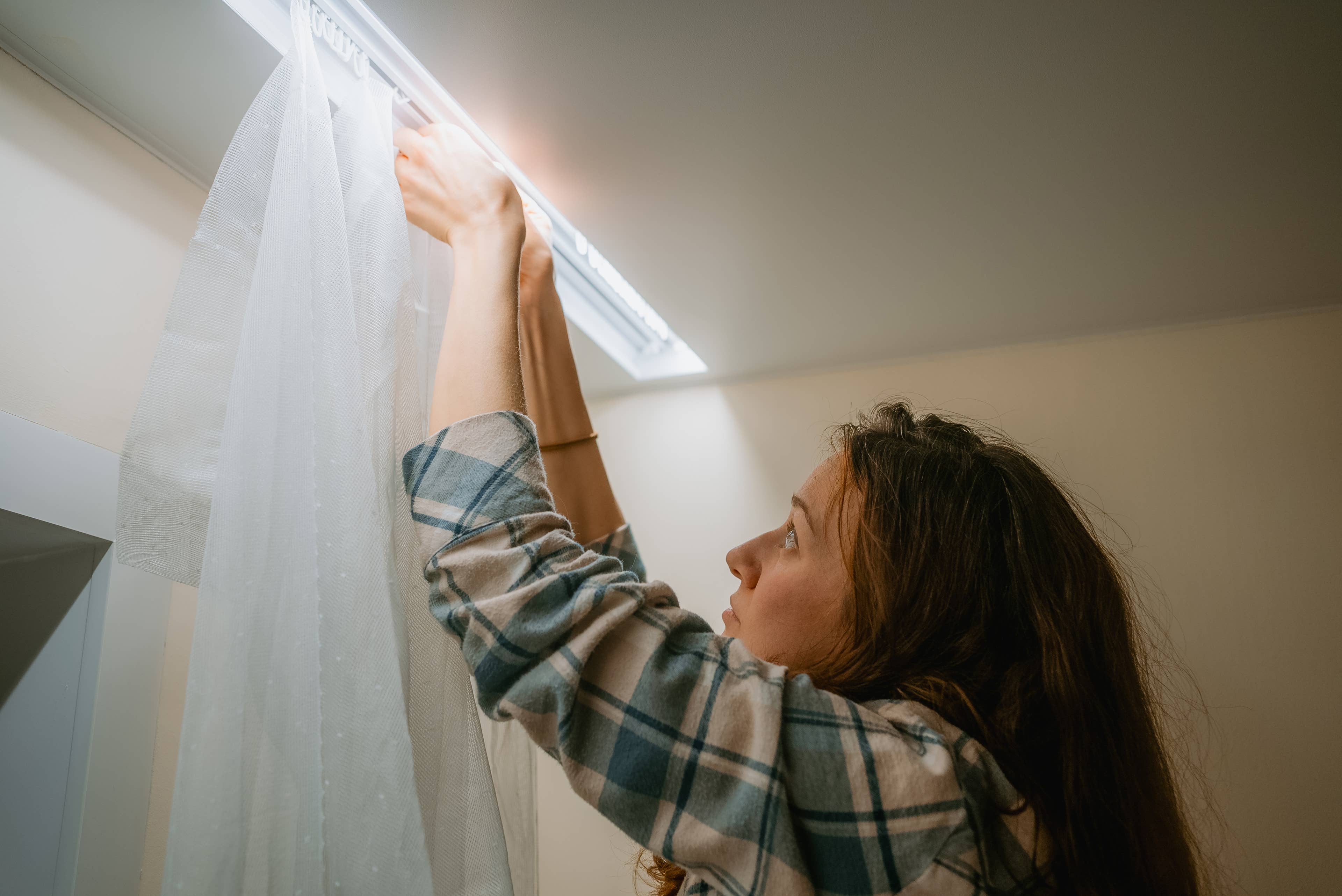 Simple Under-$6 Walmart Find Lets You Hang Curtains Without Damaging Your Walls