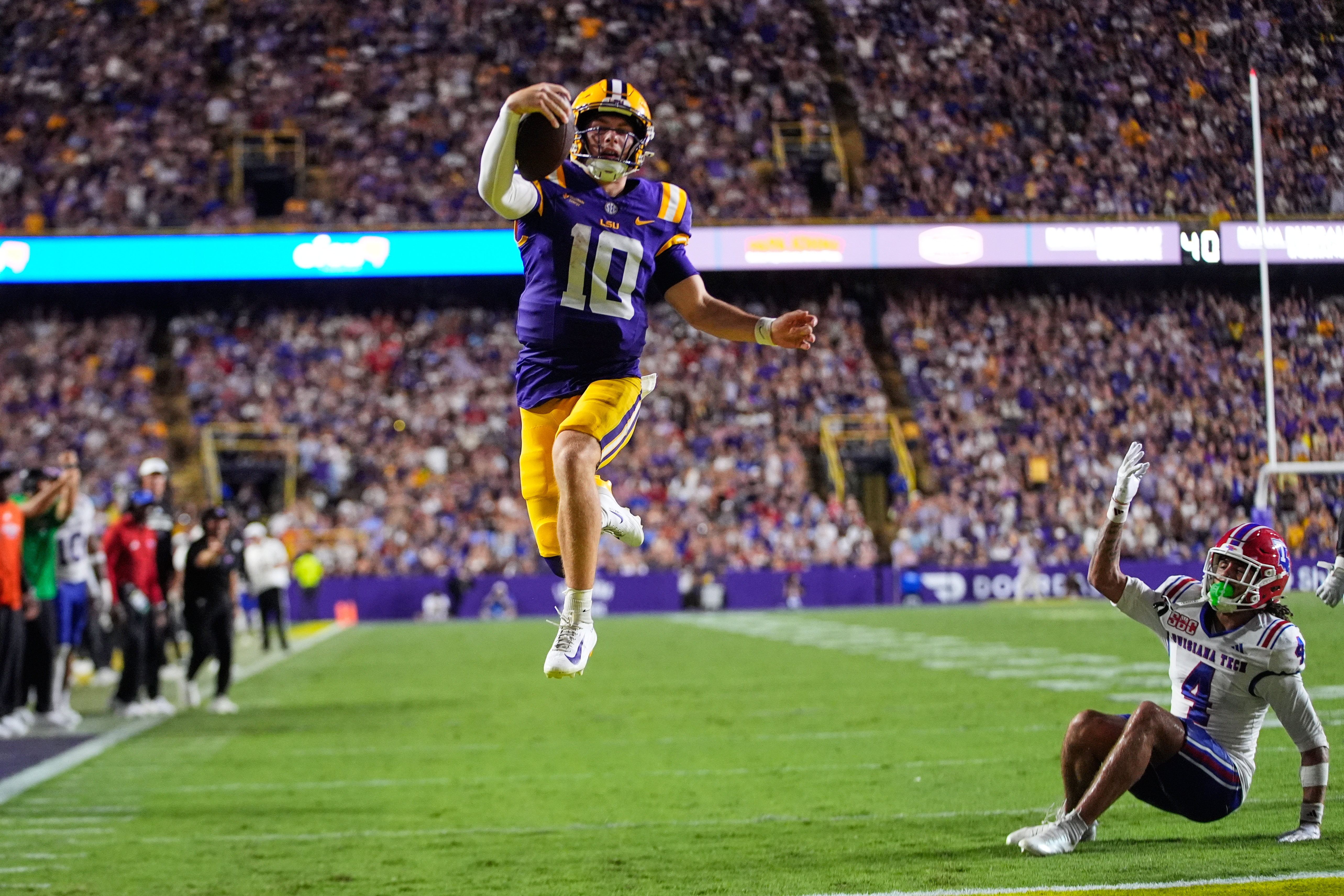 New Photo - Breaking down the college sports act: A salary cap, a 'Lane Kiffin rule' and a superleague ban