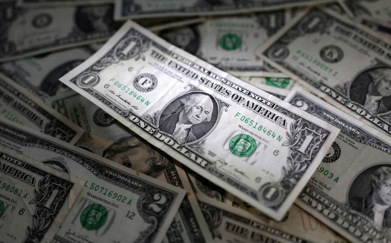Hawkish Fed lifts dollar to seven-week high as focus turn to BOJ
