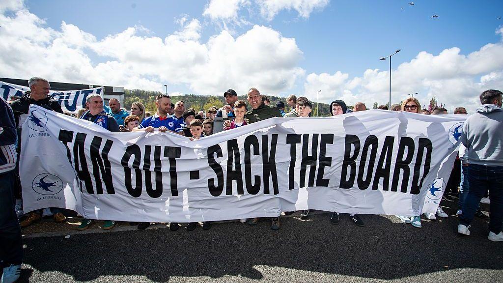 New Photo - Owner Tan's 1,000 days without attending a Cardiff game