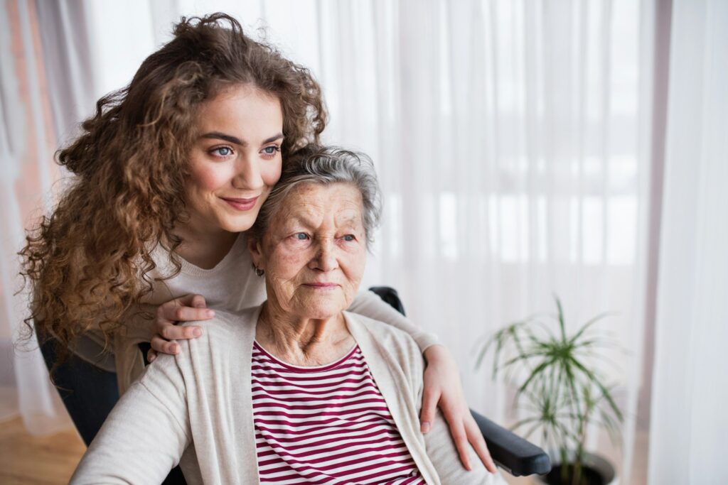 older parent and caregiving daughter