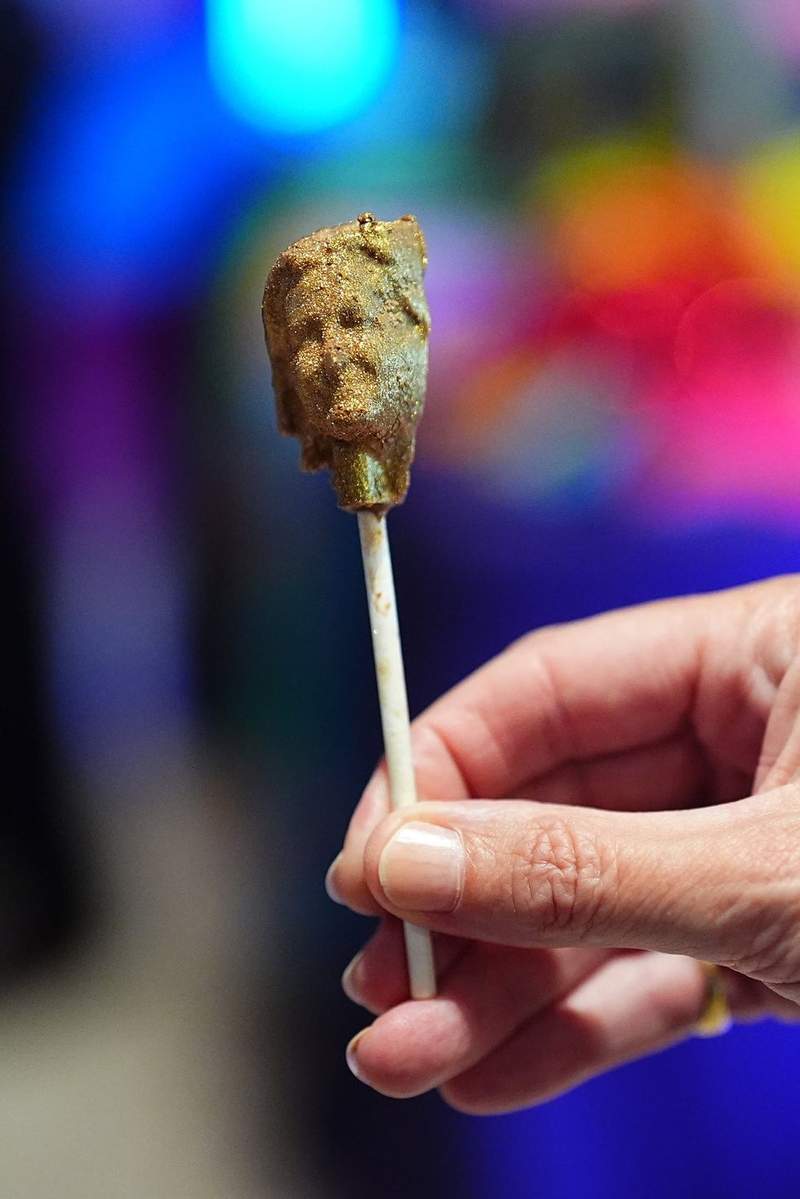 New Photo - Sophie left in stitches as BBC Traitors star hands her a chocolate lollipop