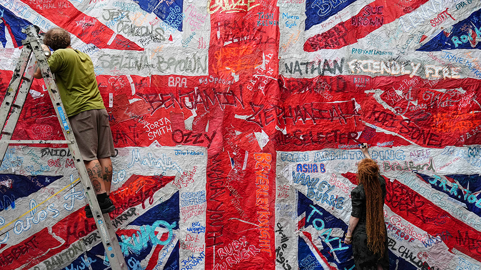 Discarded lamp-post flags turned into 'unity' artwork - AOL