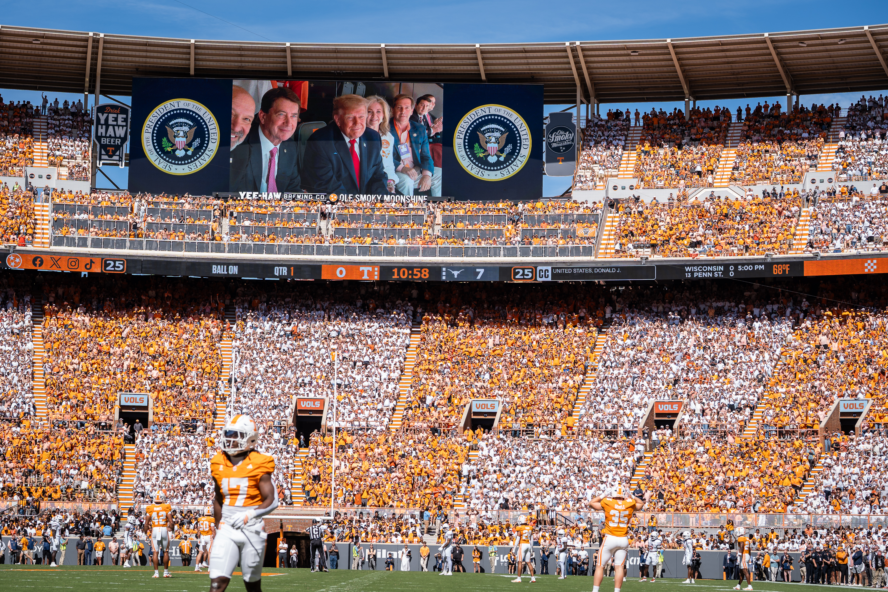 New Photo - Trump attends Texas-Tennessee game with no apparent disruption to coaches' communications