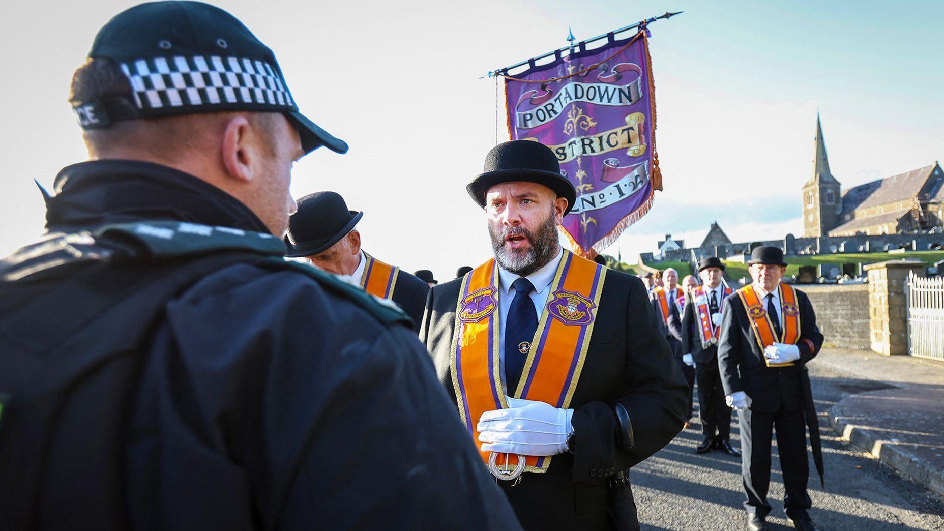 Orange Order parade dispute continues as main players hold talks - AOL