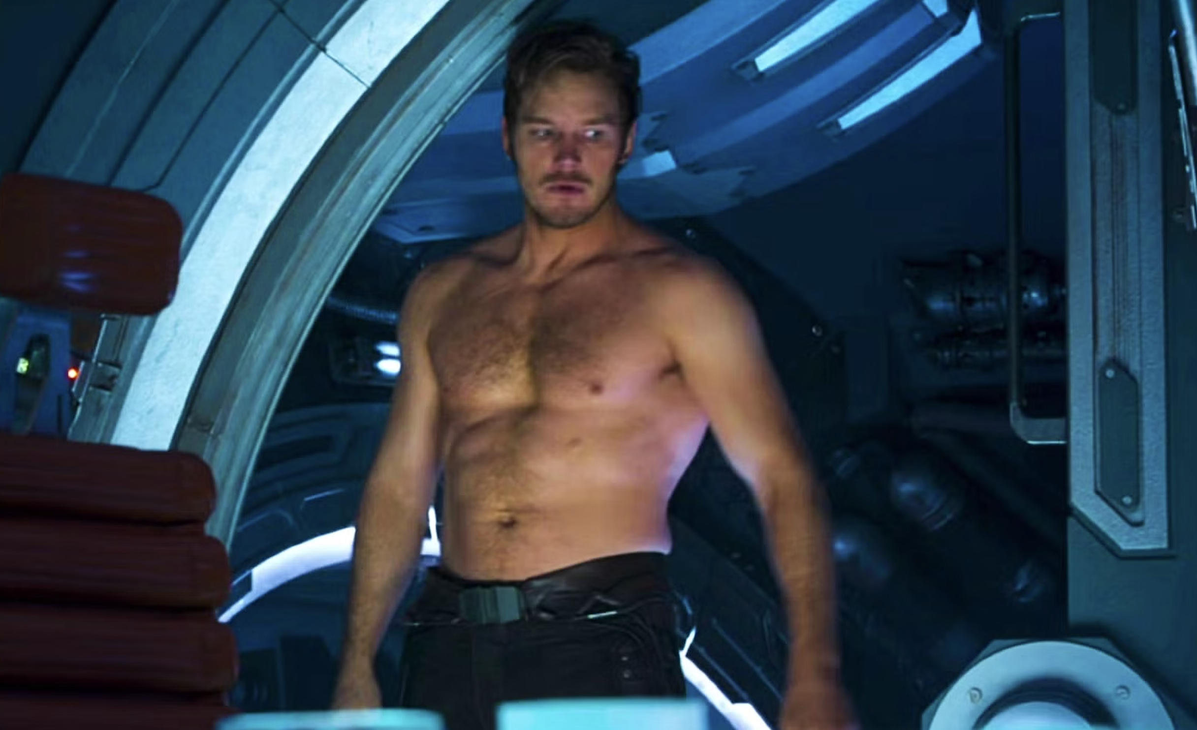 Pratt standing in a sci-fi spaceship setting, looking serious