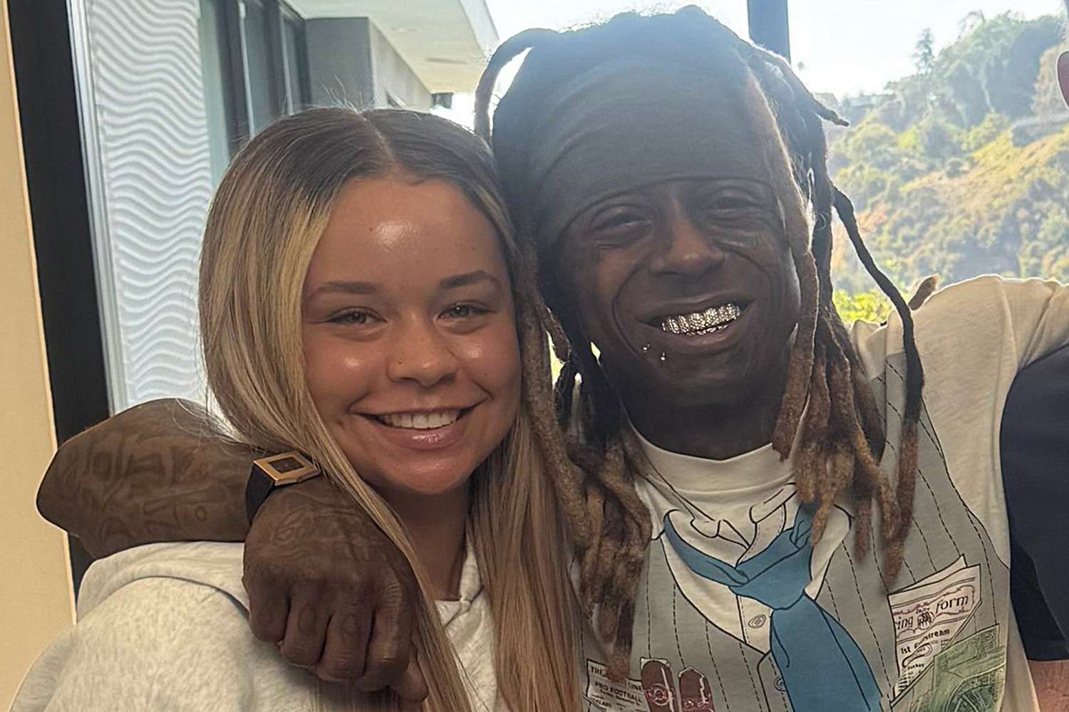 New Photo - Lil Wayne Seemingly Announces Engagement to 23-Year-Old Madi Cannon: ‘This Is My Fiancée’