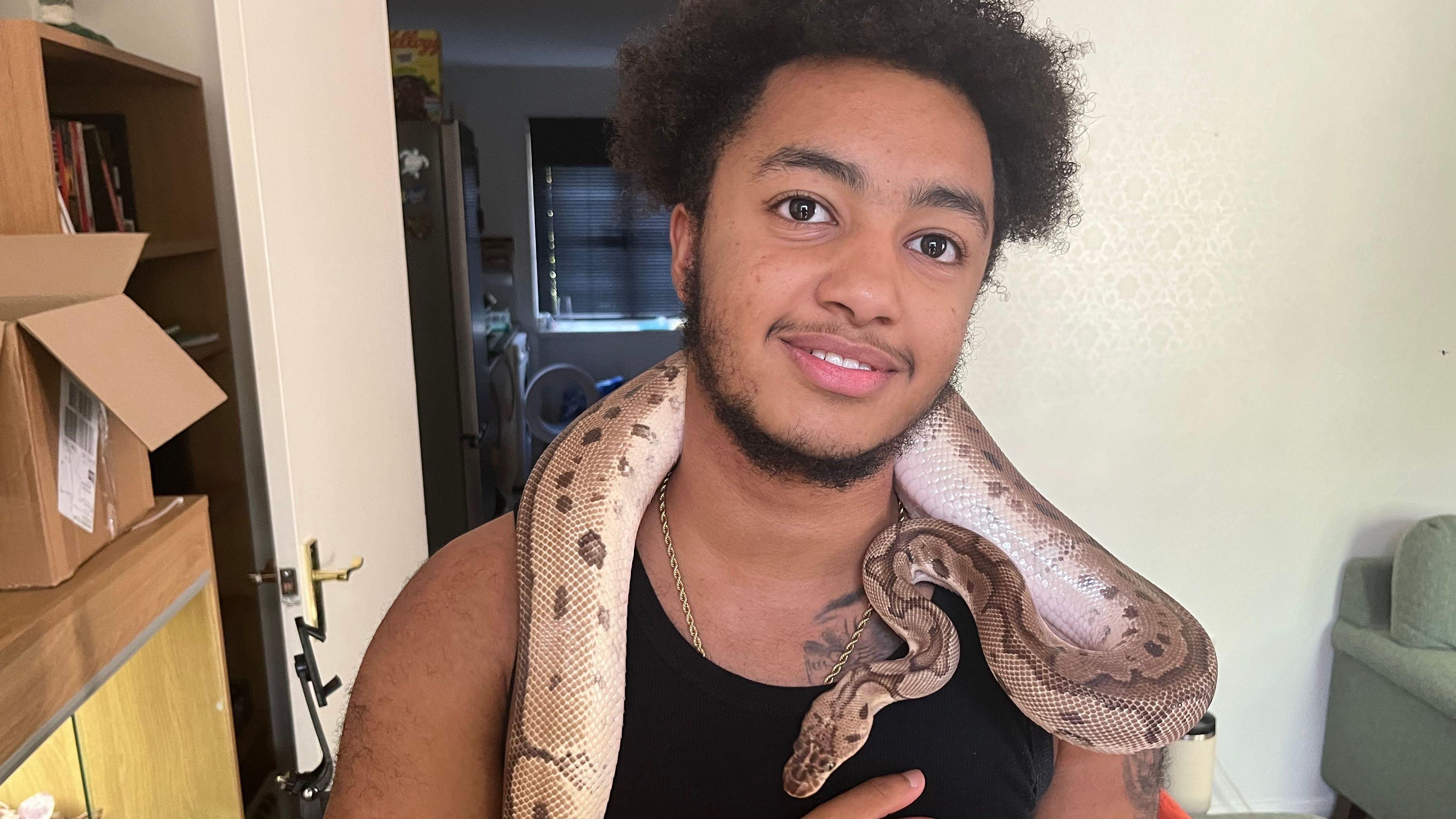 Snake's alive: Pet python found weeks after escape - AOL