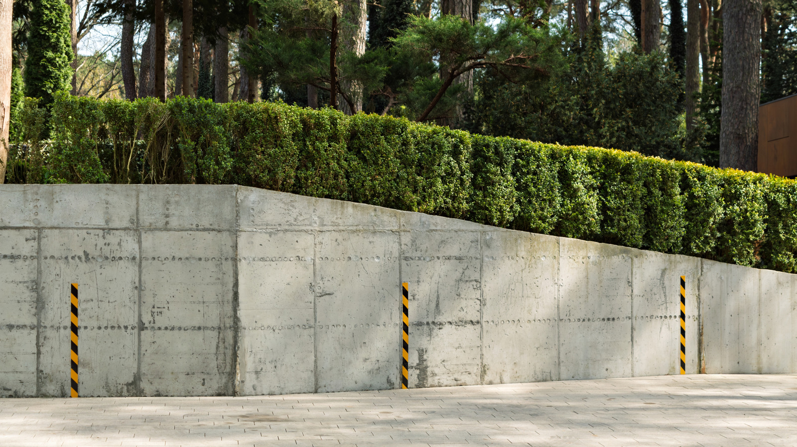 Not Concrete Or Brick: The Retaining Wall Idea To Add Visual Interest & Boost Home Value